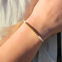 Gold Beaded String Bracelet